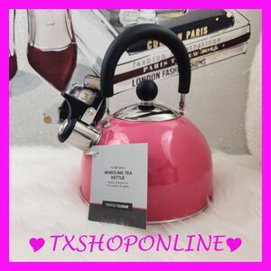 Pink whistling tea kettle